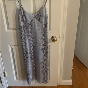 Woman’s snake print dress !